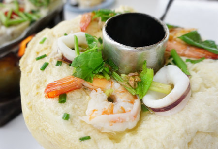 Steamed egg with seafood in hot pot, Thai cuisineの写真素材