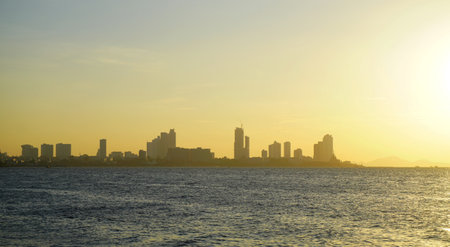 Silhouette of Pattaya city with seaside view and sunset sky background, Travel backgroundの写真素材