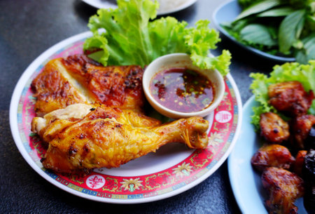 Roasted chicken with sweet chili sauce,Thai north eastern food styleの写真素材
