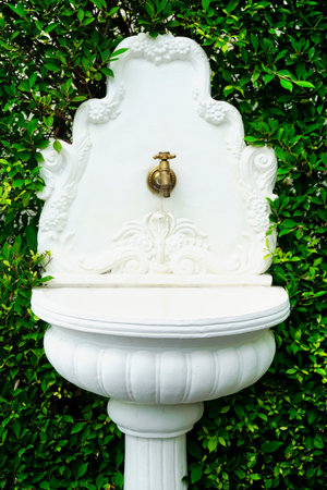 White basin with classic style and pipe decorate at gardenの写真素材