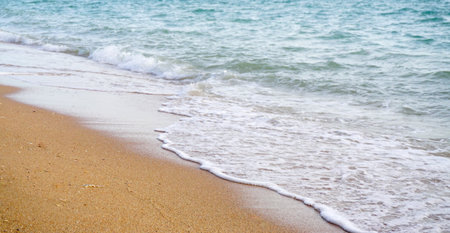 Sea surf with sand and beach background, Nature backgroundの写真素材