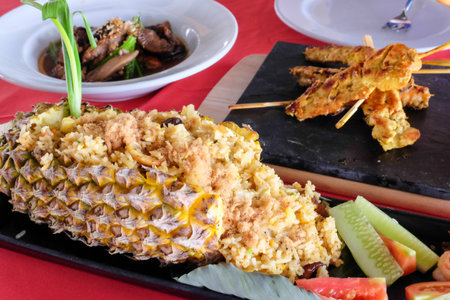 Pineapple Fried Rice on tableの写真素材
