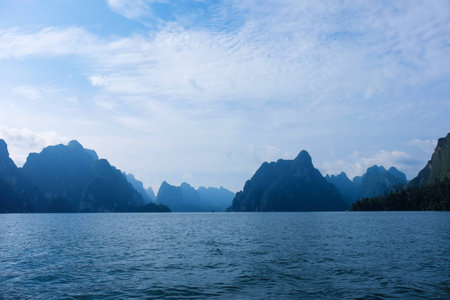 Beautiful lake and mountain background at Ratchaprapa dam , khao sok national park ,Thailandの写真素材