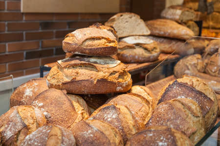 Loaves of bread at a local store. bakery, tradeの写真素材