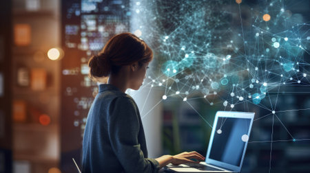 a girl working on a desktop computer with data analytics screen and new york skyline visible through window.の素材