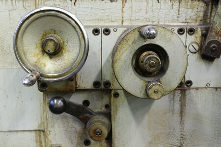 Adjusting wheels on a surface grinding machine