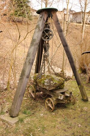 Old pulley and old wagon in an open-air museum in Bernies in the Bavarian Forestのeditorial素材