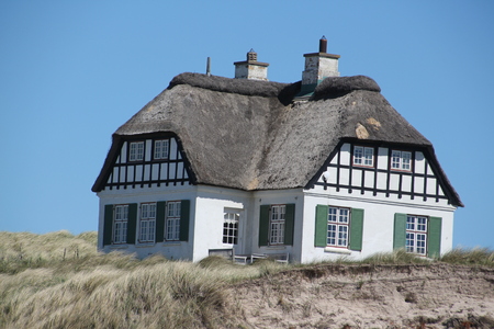 Cottage in the dunes of Loekken in the north of Denmarkの写真素材