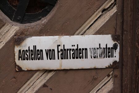 Old sign in the courtyard of Schlo? Geyersw?rth in the old town of Bamberg in Bavariaの写真素材