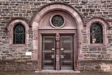 Entrance portal of a historic church in the center of Schmallenberg in the Sauerland