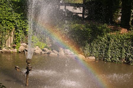 Rainbow in a fountainの写真素材