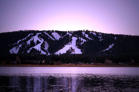 Big Bear California ski mountain above lake at duskの写真素材