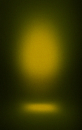 soft yellow spotlight background blur, dark color shadows and place for standing vertical.の写真素材