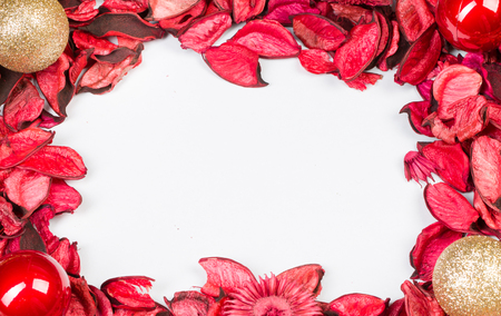 Roses petals on white isolated background. Love template for valentines day pink flowers around. Nothing in in center pure empty mockup.の写真素材