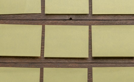 Many yellow stickers for advertising closeup mockup template textarea spaceの写真素材