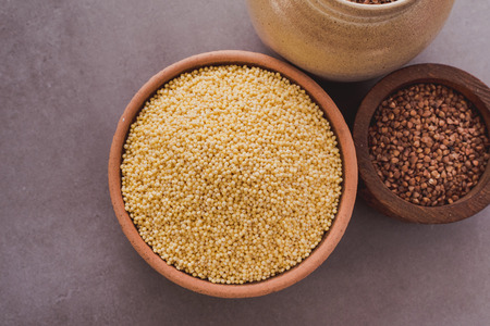 Superfood, groats & seeds, a healthy mix for a healthy lifestyle on stone neutral background