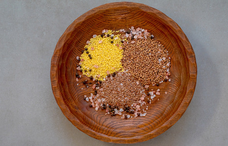 Superfood, groats & seeds, a healthy mix for a healthy lifestyle on stone neutral backgroundの写真素材