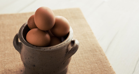 Fresh eggs in wicker basket, Prepare chicken eggs and eggs for cooking or bakery.の写真素材