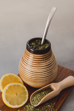 Yerba Mate tea on neutral stone gray background.