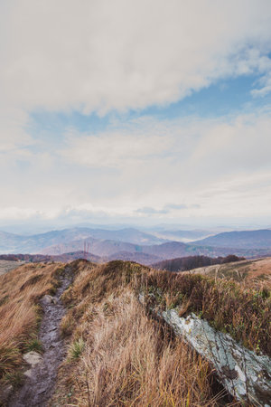 Autumn in the Bieszczady Mountains Poland. Trekking trail, blue sky.の写真素材