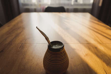 Yerba mate in ceramic matero, bombilla.