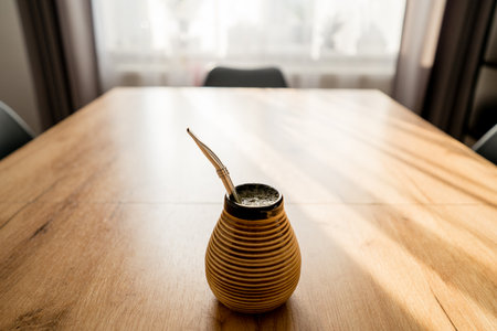 Coffee pot on the wooden table in cafe, stock photoの写真素材