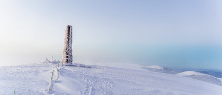 Panoramic view of snowy mountain peak in winter, Czech Republicの写真素材