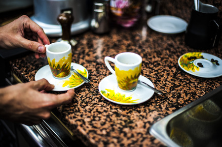 barman serving original italian coffeeの写真素材