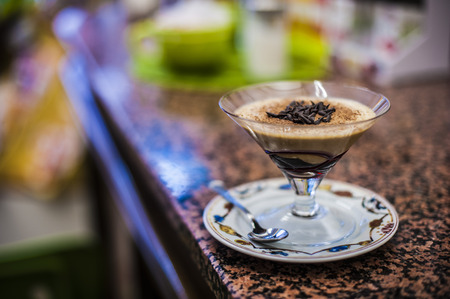 barman serving cold coffee creamの写真素材