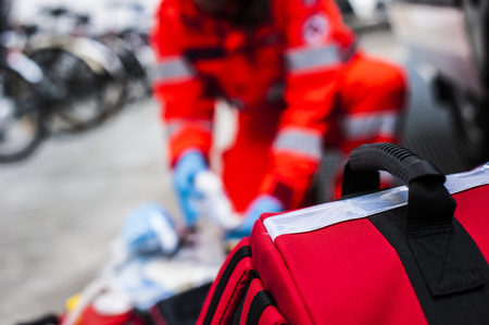 volunteer rescue worker with medical materialの写真素材