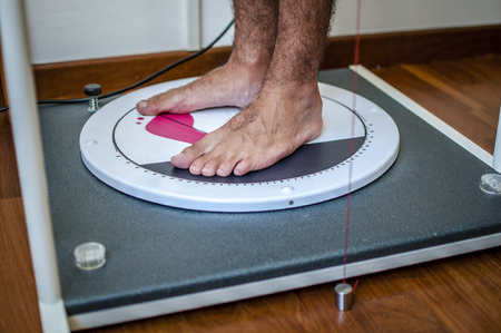 orthopedic physiotherapist check body growth of young athleteの写真素材