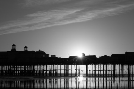 Atmospheric image of a pier at sunsetの写真素材