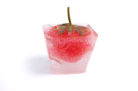 Strawberry in an ice cubeの写真素材