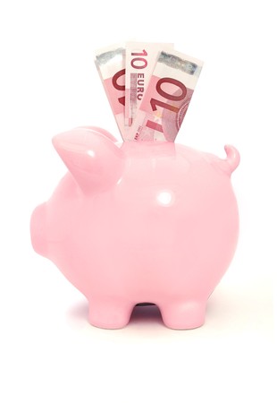 Euro notes inside a piggybank の写真素材