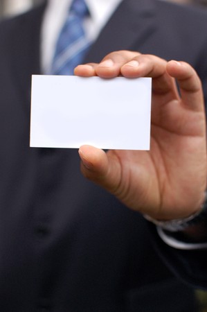 Business man with cardの写真素材