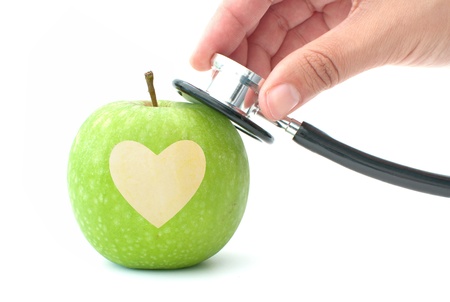 Stethoscope and apple heartの写真素材