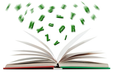 Letters of the alphabet flying out of a book の写真素材