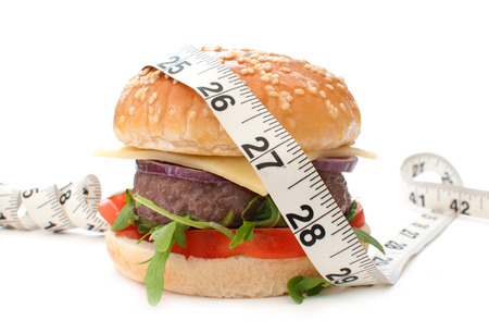 Burger with measuring tapeの写真素材