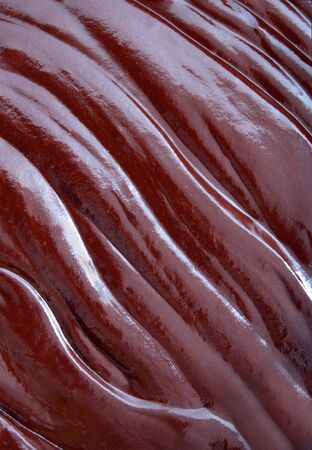 Creamy thick melted hot chocolate with a rippled textureの写真素材