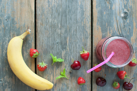 Berry smoothie in a jar with copyspaceの写真素材
