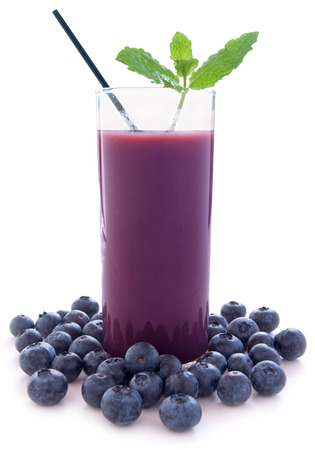 Blueberry smoothie over a white backgroundの写真素材