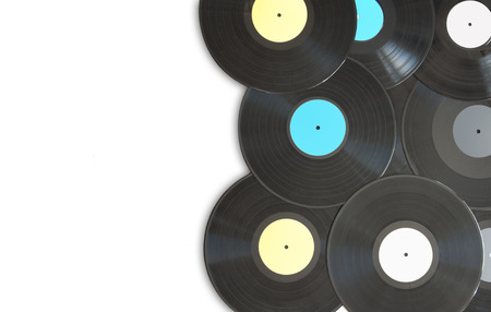 Vinyl records on top of a white background with spaceの写真素材