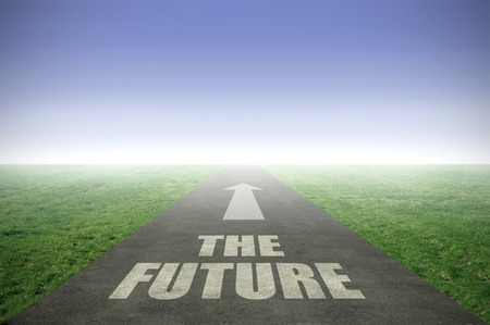 The future painted on an open road leading out to the horizonの写真素材