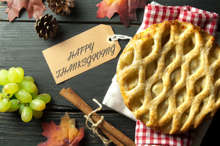 Thanksgiving label attached to apple pieの写真素材