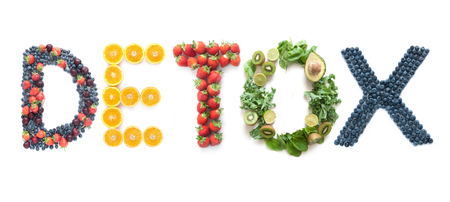 Detox spelt using different groups of fruits and vegetables over a white backgroundの写真素材