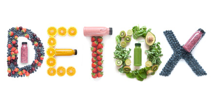 Detox spelt using different groups of fruits and vegetables with bottled smoothie beveragesの写真素材