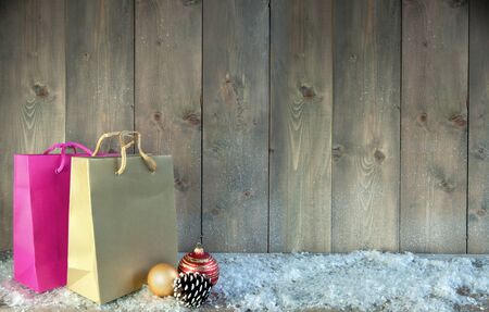 Shopping bags with baubles with space for textの写真素材