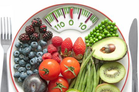 Bathroom weighing scales made of vegetables with healthy natural ingredients の写真素材