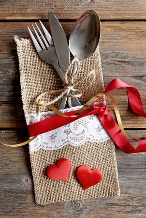 Cutlery set inside pouch with silk ribbon and a gift boxの写真素材
