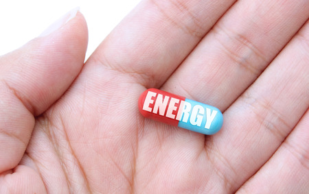 Close up of a hand holding an energy pillの写真素材